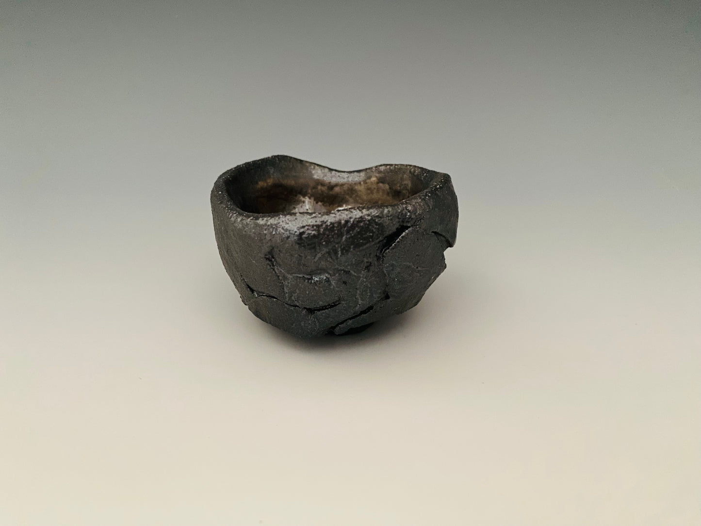 Wood fired sake cup, black clay