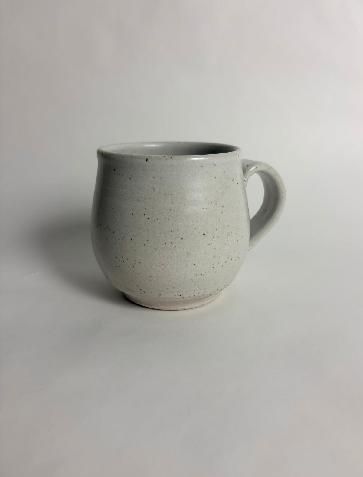 Mug with a Speckled Off White Glaze
