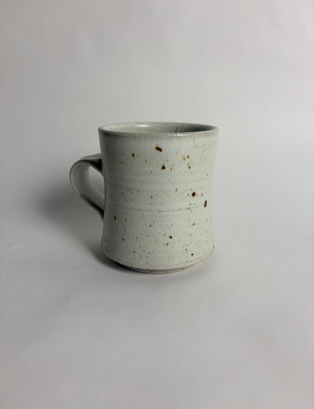 Mug with a Speckled Off White Glaze