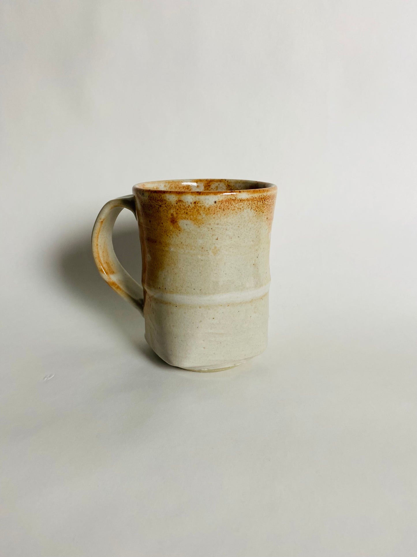 Mug with a Creme and Orange Glaze