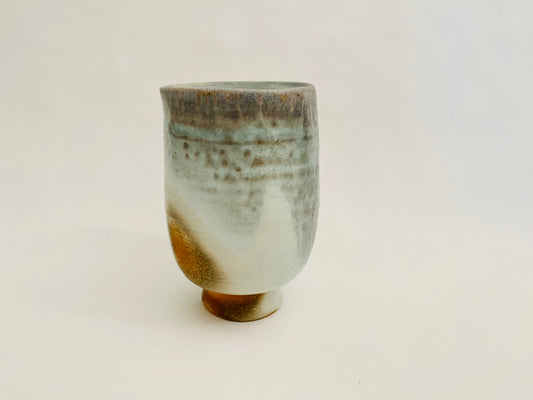 Wood fired porcelain cup.