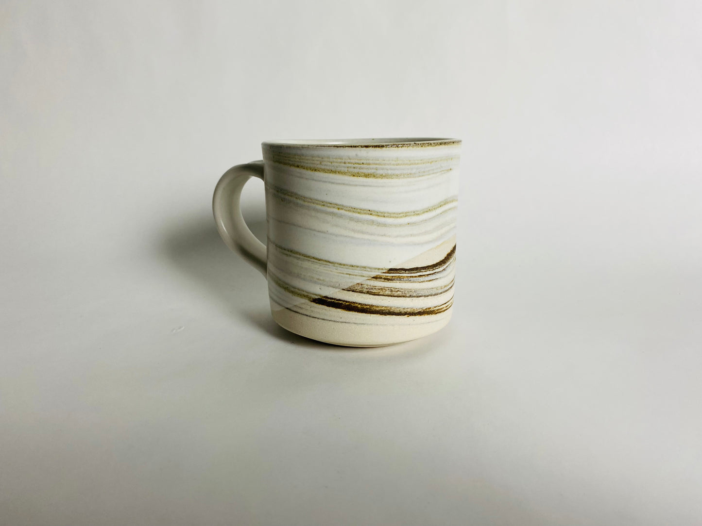 Mug with a White Glaze and Marbleized Clay