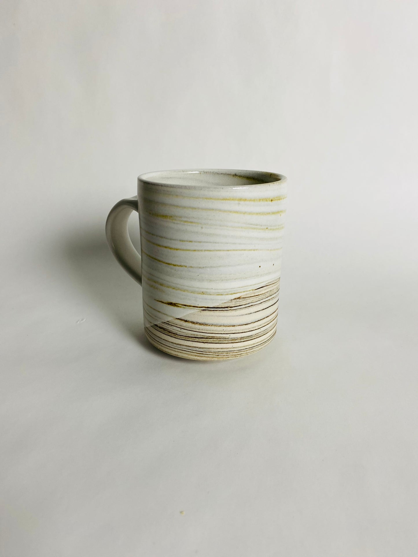 Mug with a White Glaze and Marbleized Clay