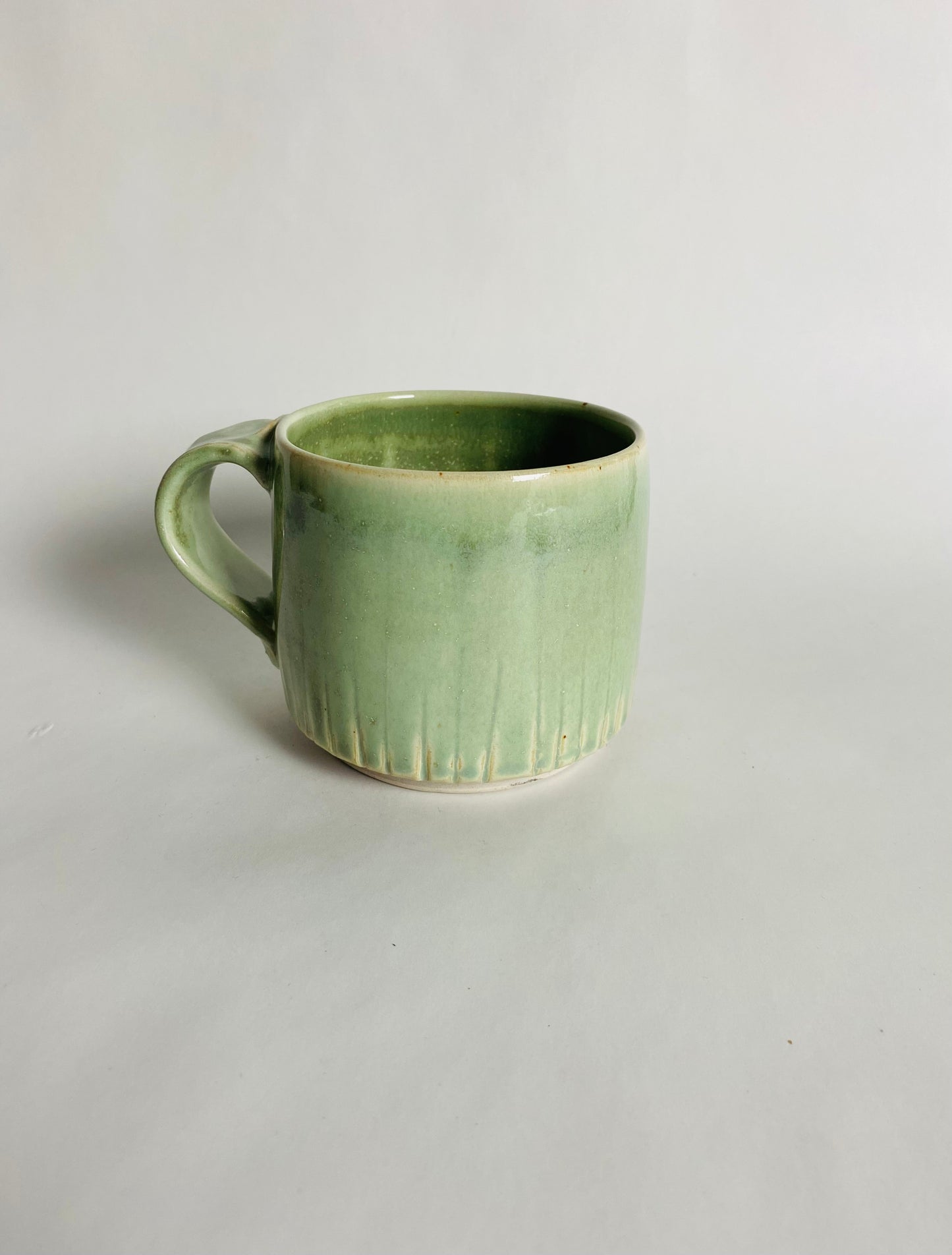 Mug in a Light Green Glaze