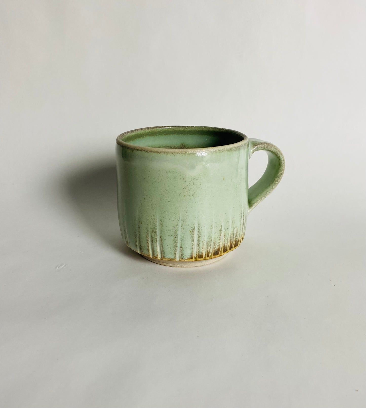 Mug in a Light Green Glaze