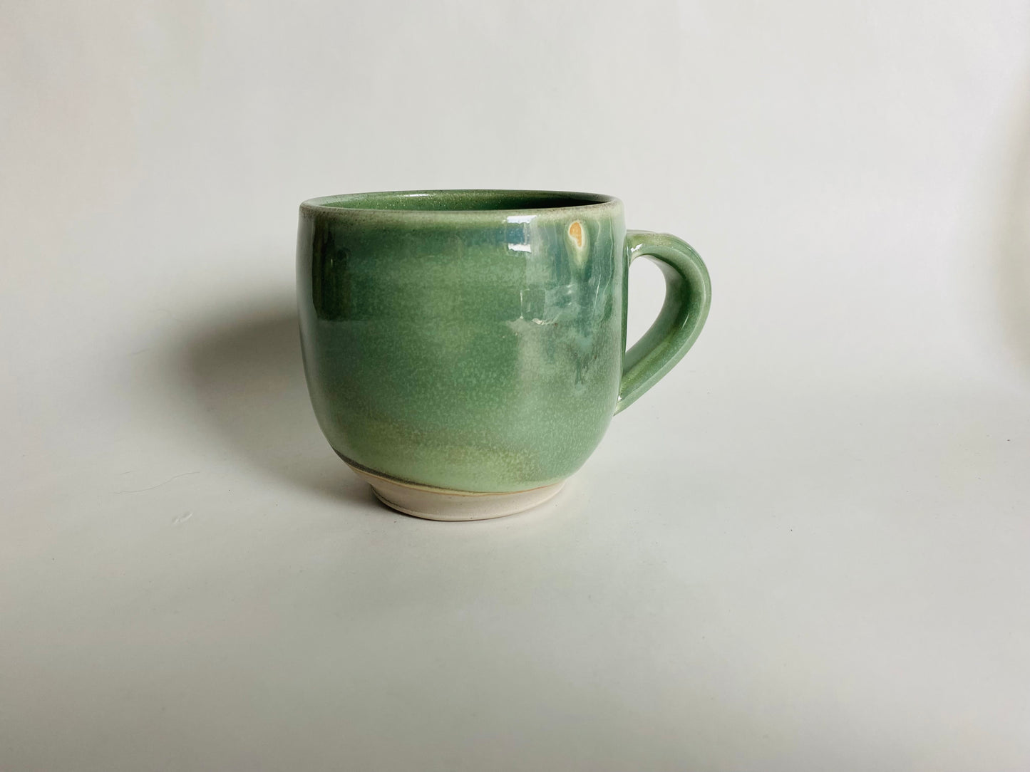 Mug in a Light Green Glaze