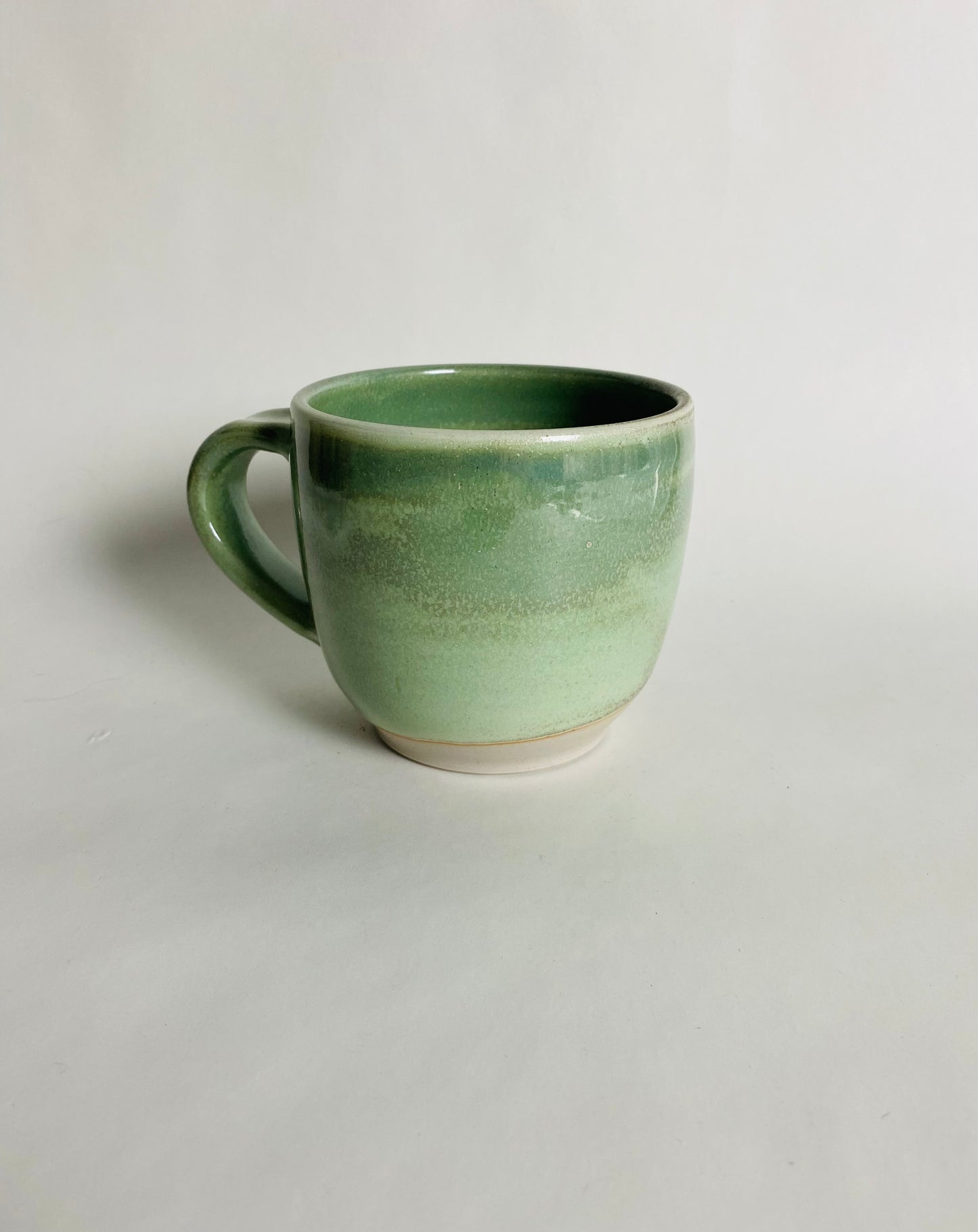 Mug in a Light Green Glaze