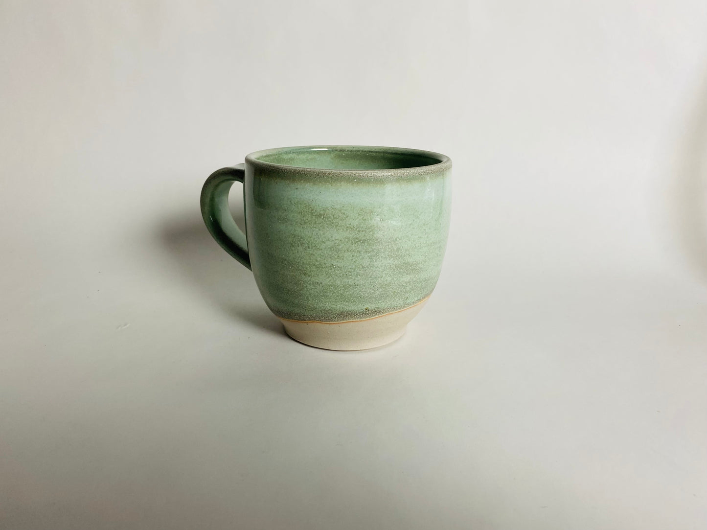 Mug in a Light Green Glaze