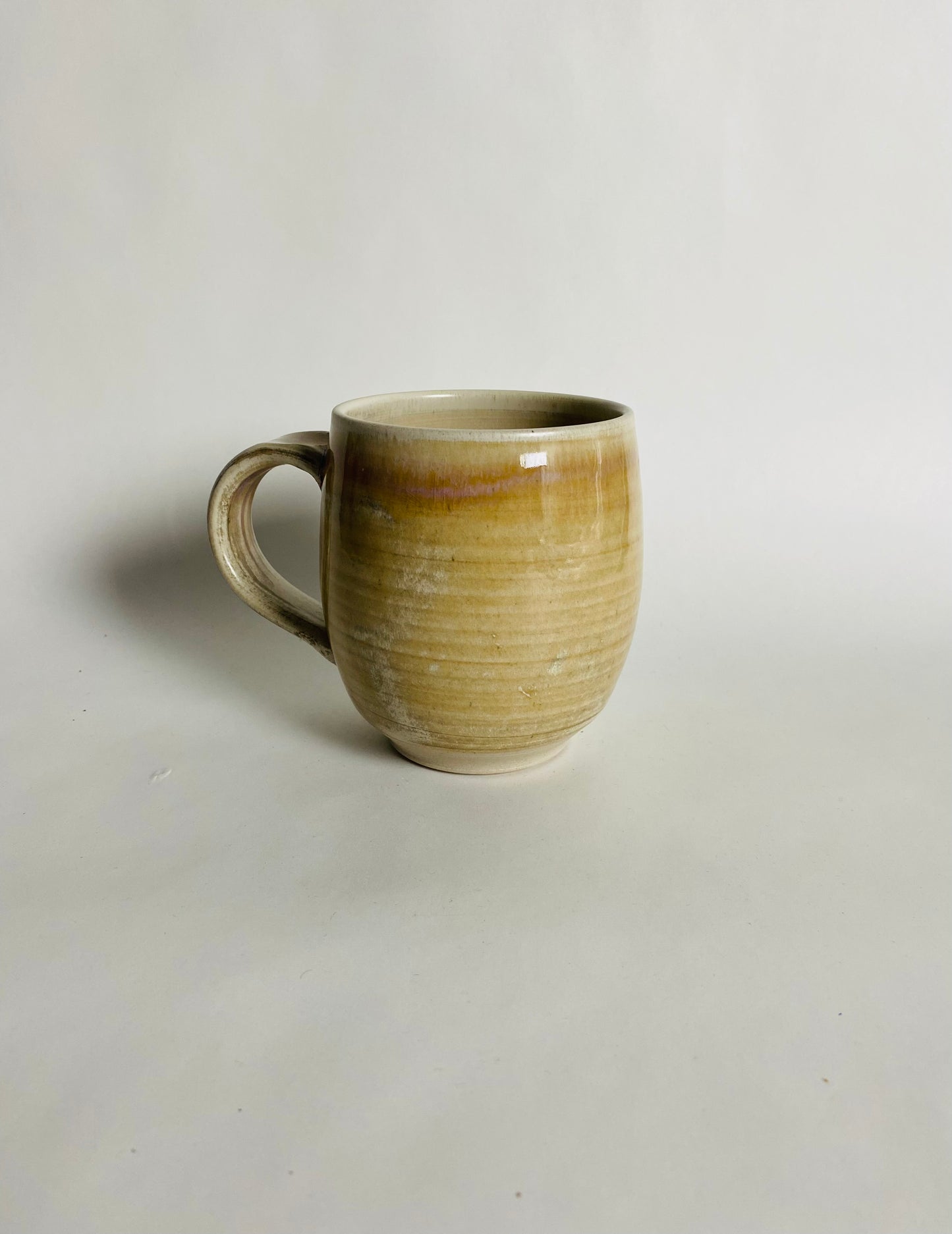 Mug with an Off White/Honey Glaze