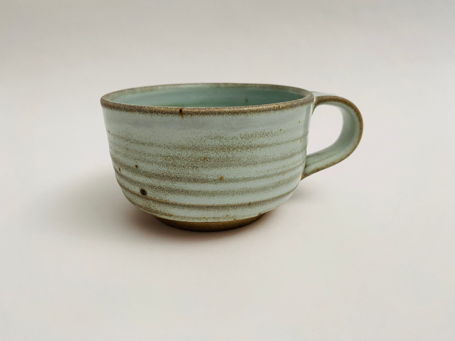 Light green stoneware mug