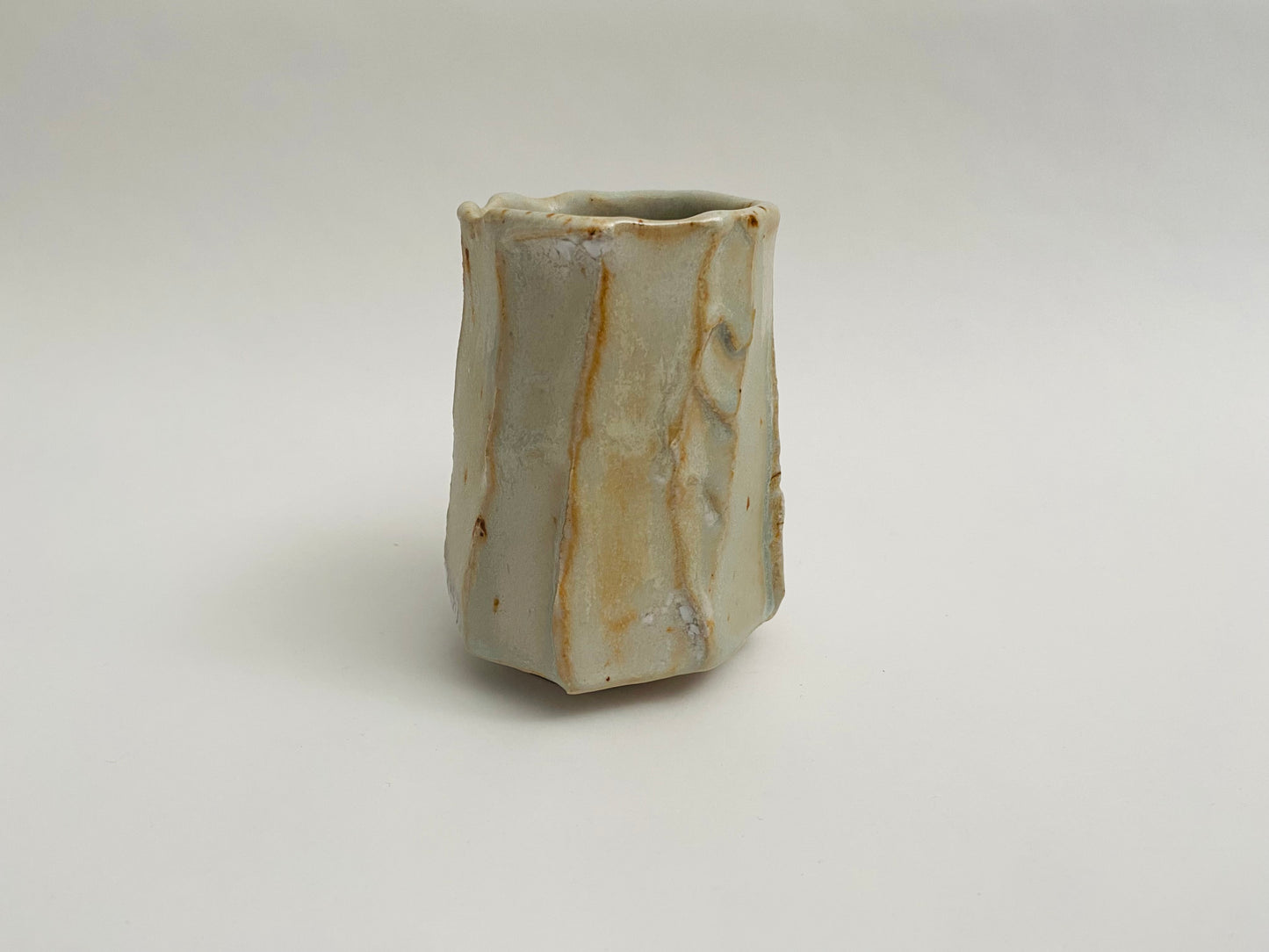 Small faceted cup in a matte glaze