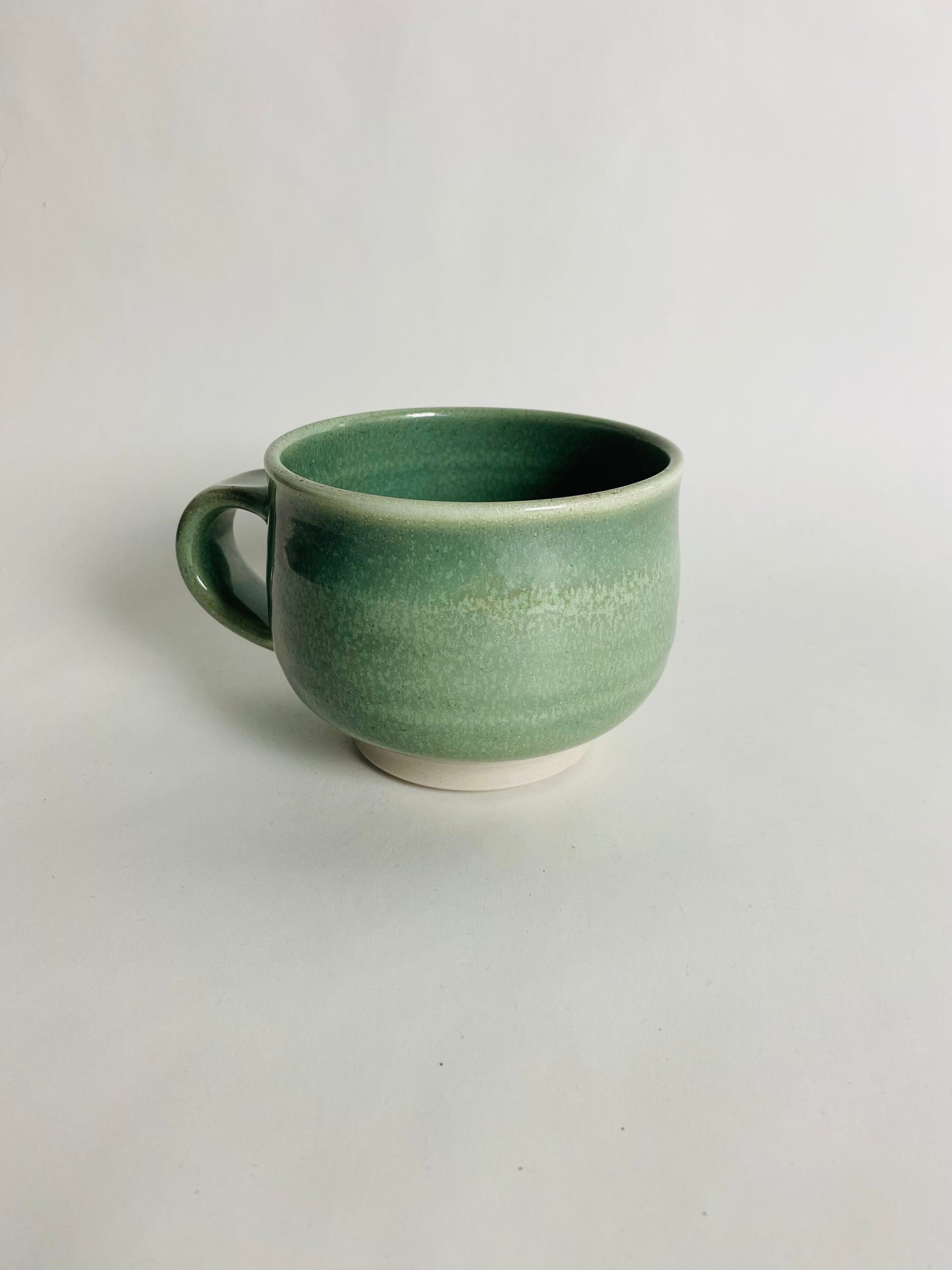 Smaller Mug with a Light Green Glaze