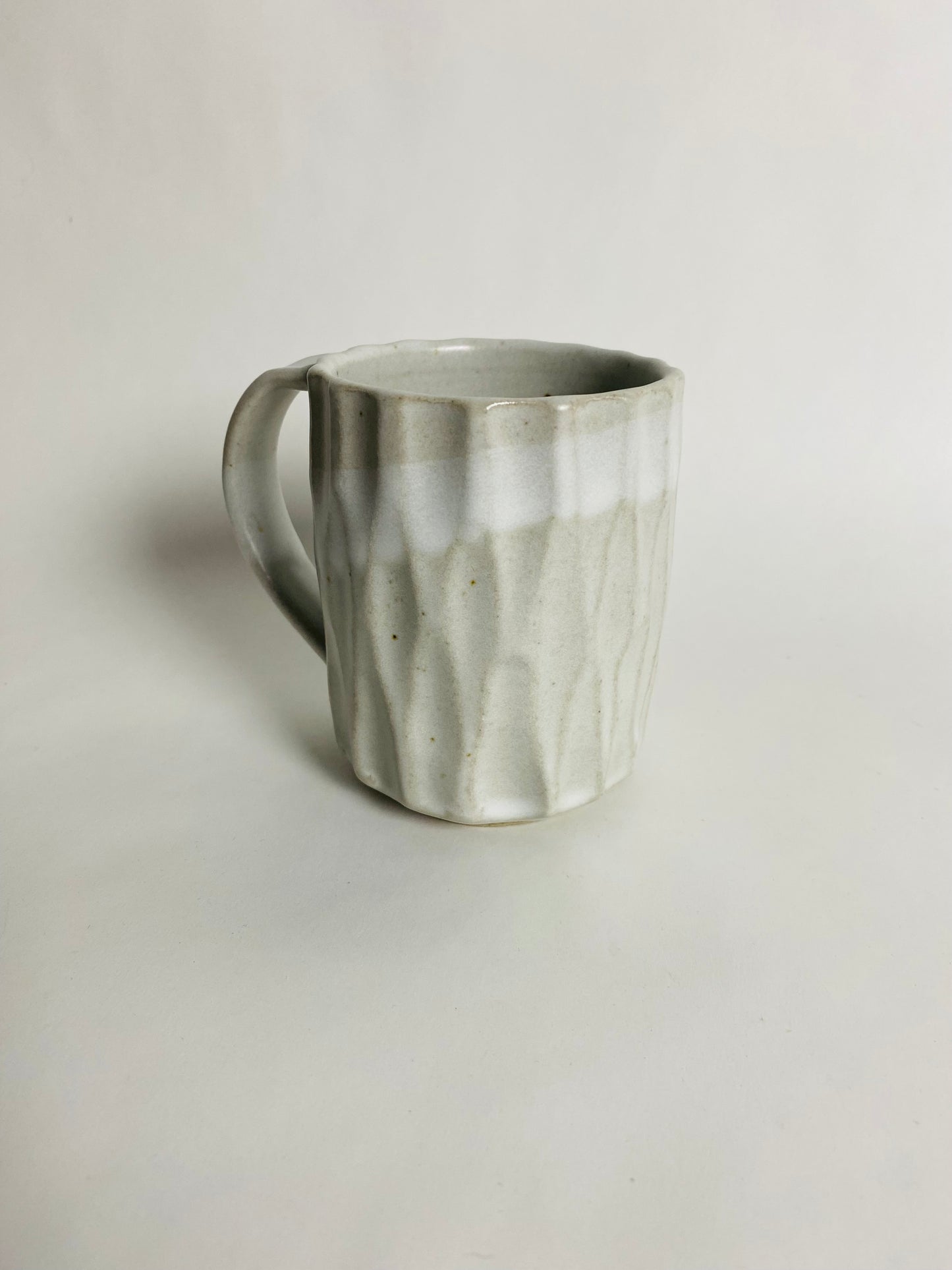 Faceted Mug in a White Glaze