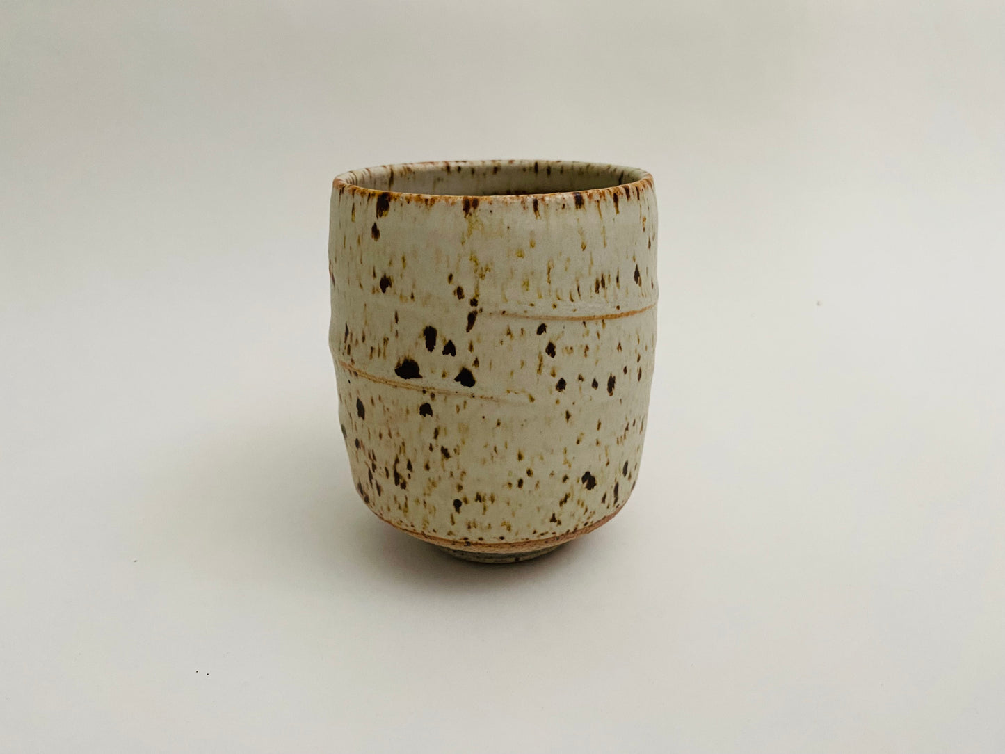 Yunomi with a matte glaze with iron flecks