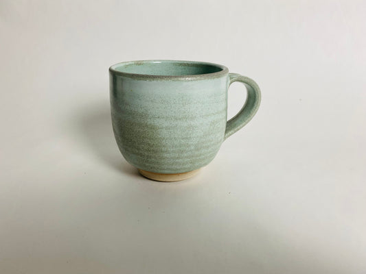 Mug with a light green glaze