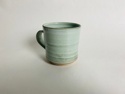 Mug with a light green glaze