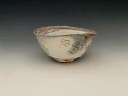 Wood fired porcelain bowl with paddle marks