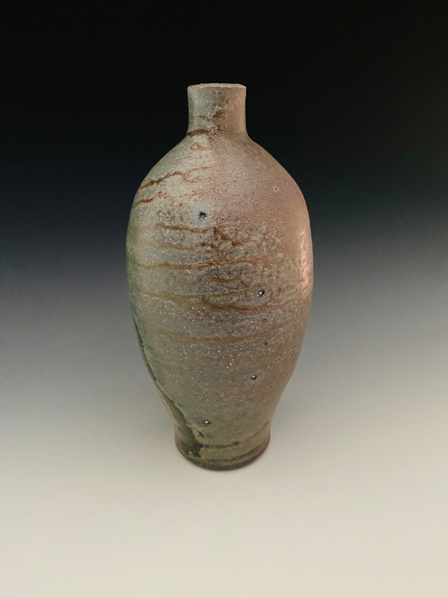 Wood fired bottle/vase with jewel.