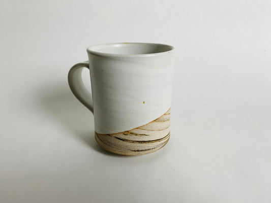 Mug with a satin white glaze and marbleized clay