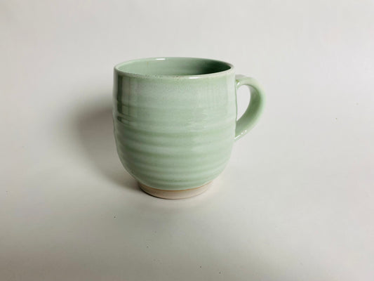 Mug with a light green glaze