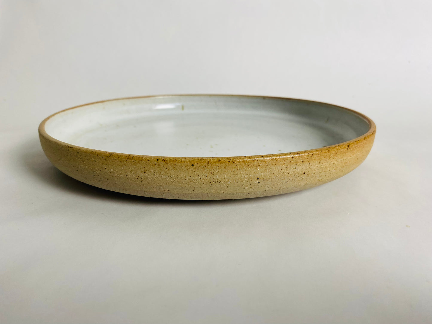 Blate with a White Glaze Interior