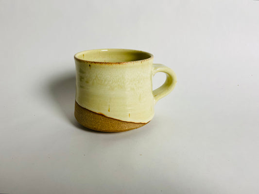 Mug with a yellow glaze