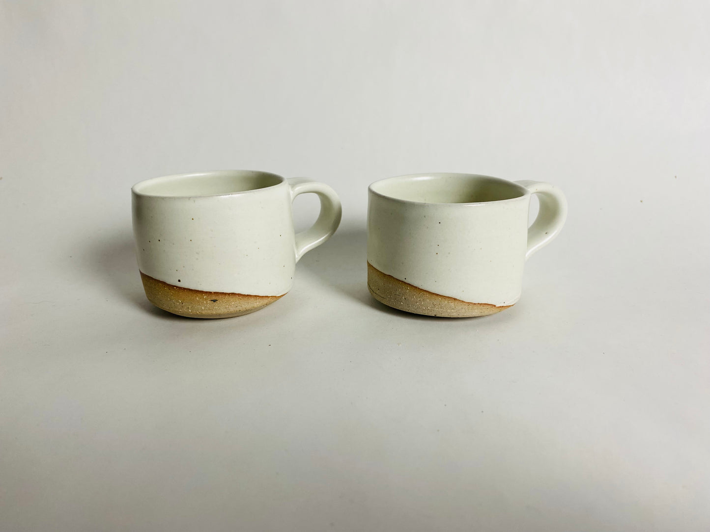 A Pair of White Espresso Cups