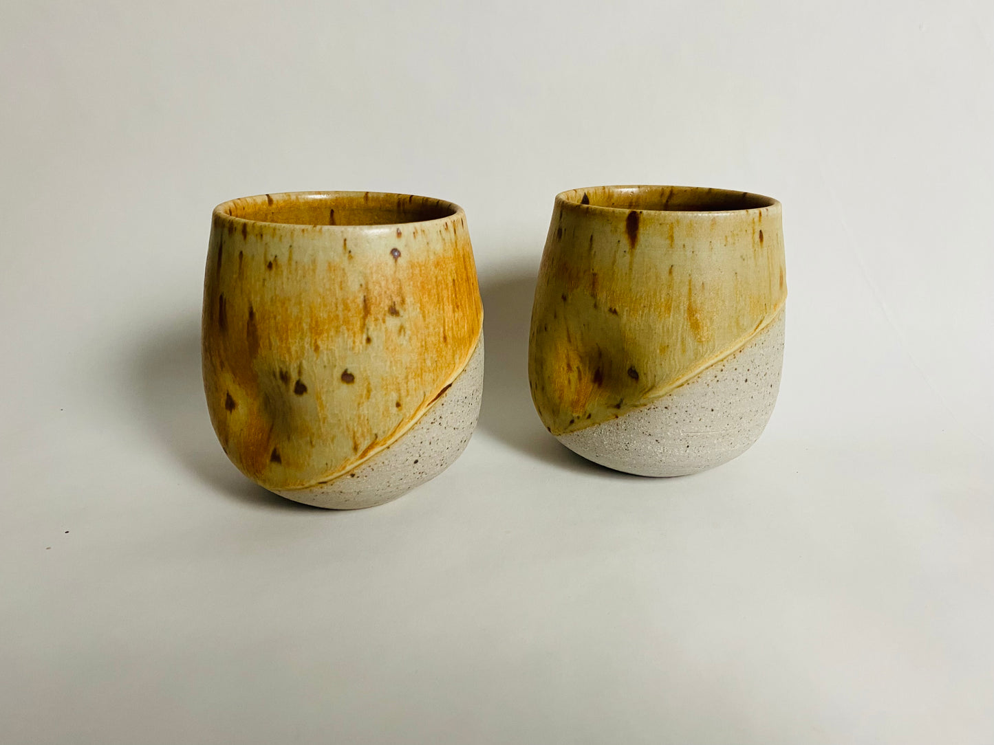 A Pair of Speckled Tumblers