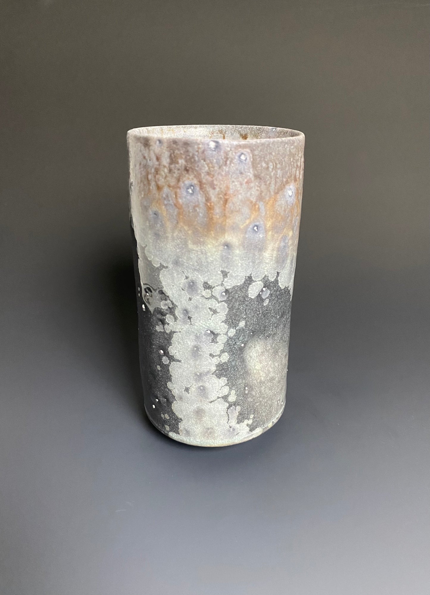 Tall Wood Fired Porcelain Tumbler with Indents and Crystals
