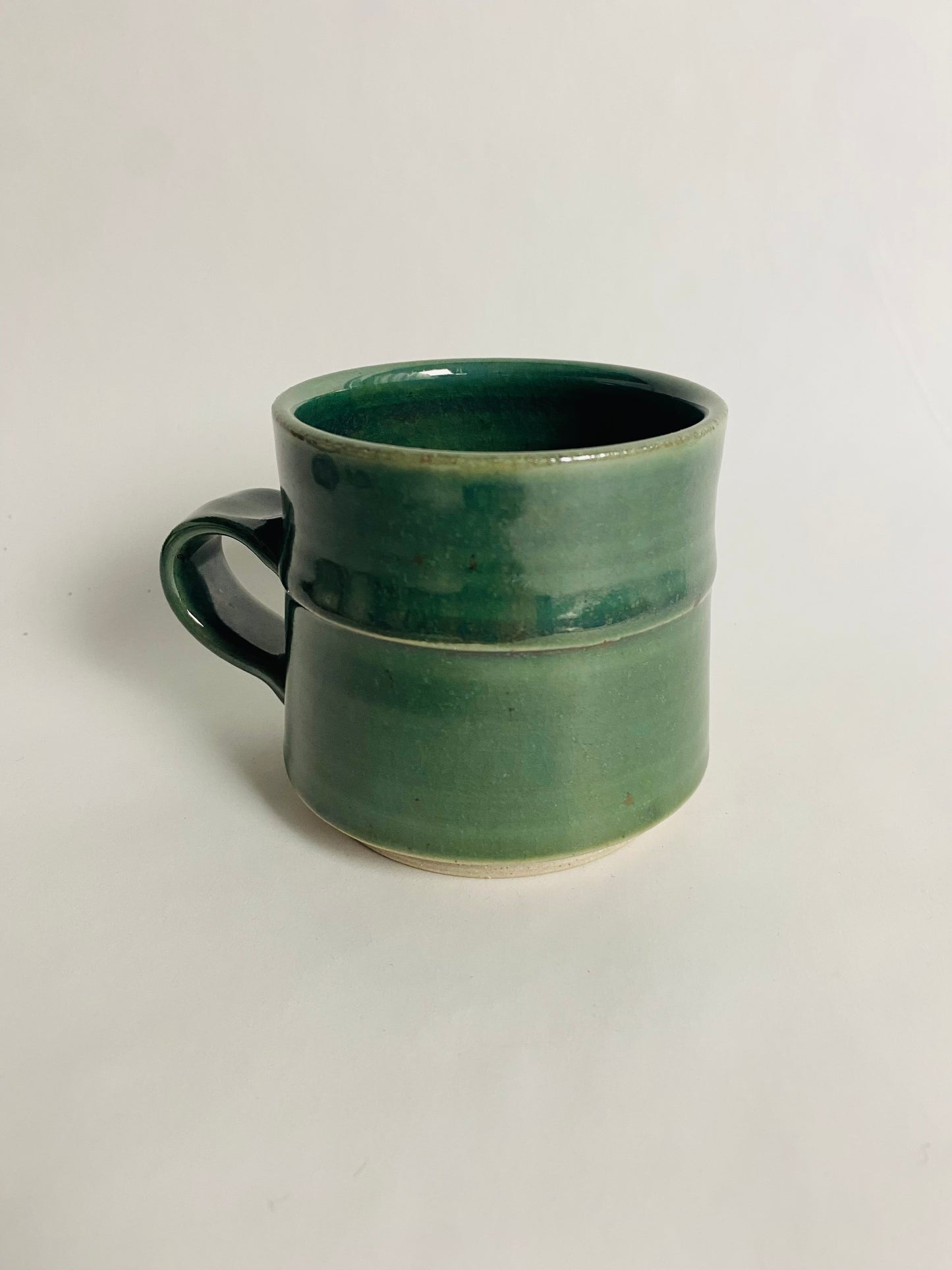 Mug with an Oribe Glaze