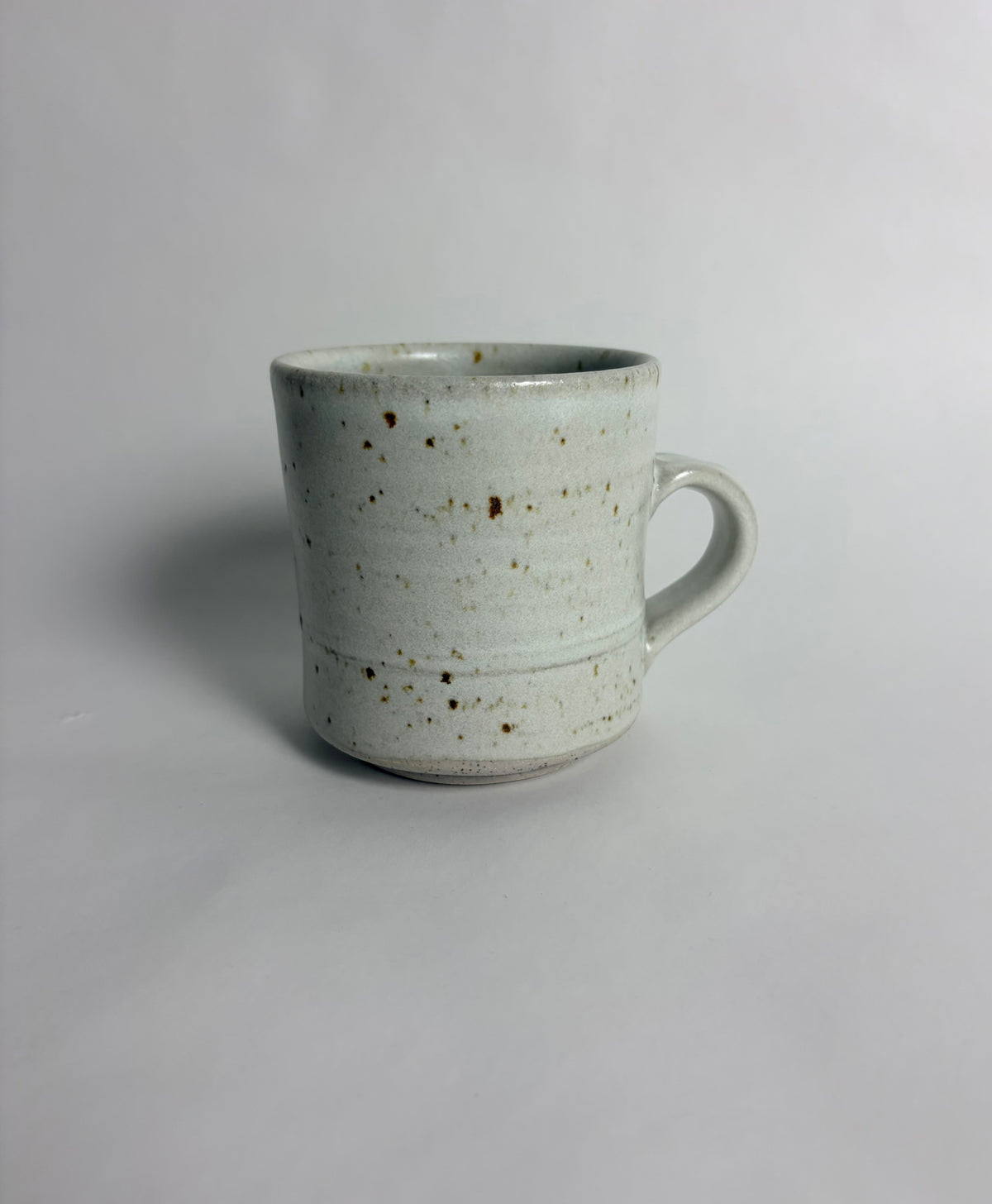 Mug with a Speckled Off White Glaze