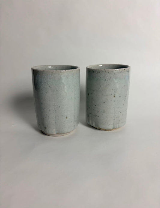 A Pair of Speckled Celadon Tumblers