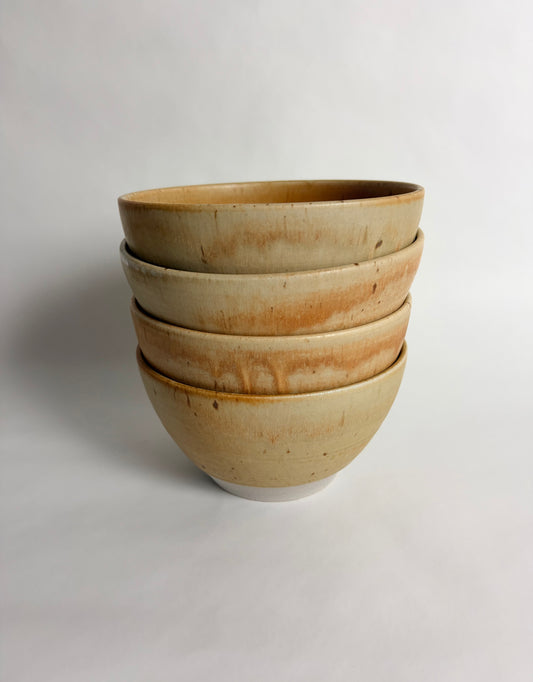 A Set of 4 Orange Creme Bowls