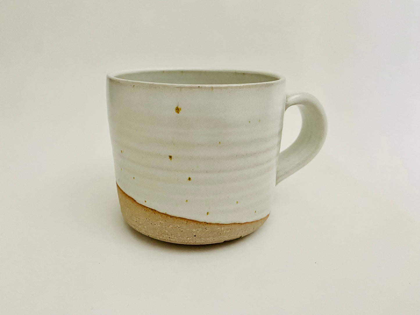 White glazed stoneware mug