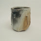 Wood fired porcelain faceted cup