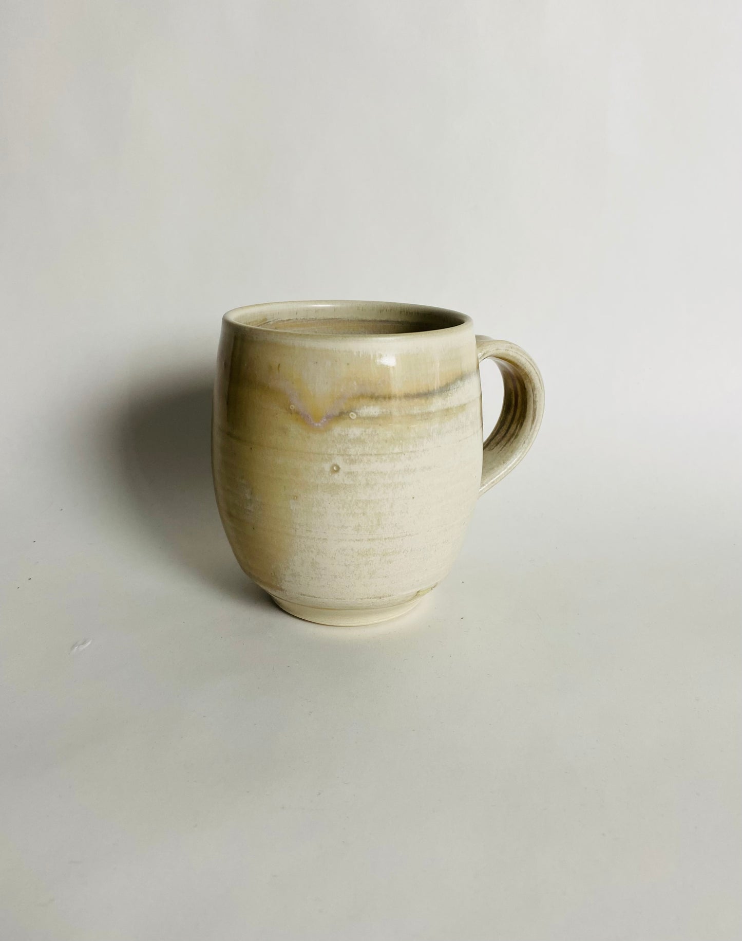 Mug with an Off White/Honey Glaze