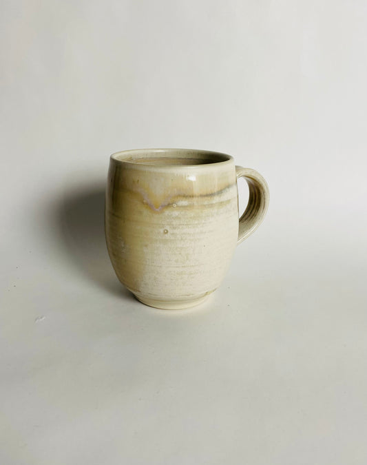 Mug with an Off White/Honey Glaze