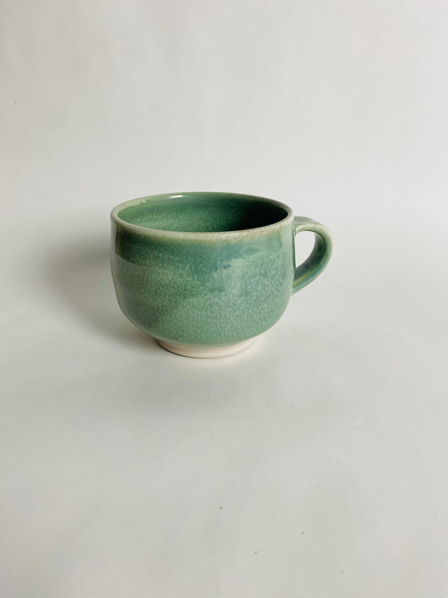 Smaller Mug with a Light Green Glaze