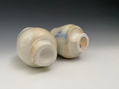 A pair of small wood fired sipping cups